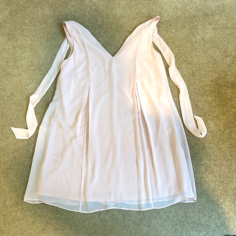 BCBG. Size S. Flowy pink dress with bow tie. Never worn. Great condition.